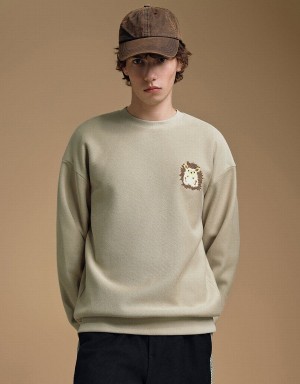 Khaki Men's Urban Revivo Hedgehog Embroidered Crew Neck Sweatshirts | RFD289GO