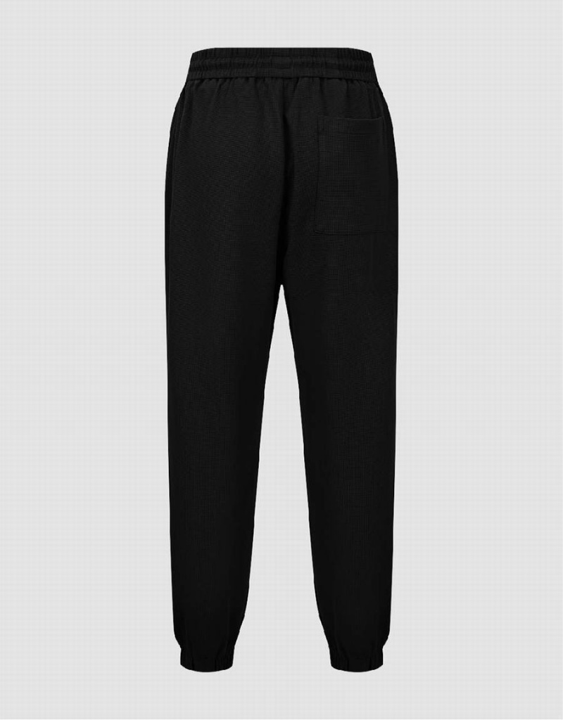 Black Men's Urban Revivo Elastic Waist Knitted Jogger Pants | PZX4813SY