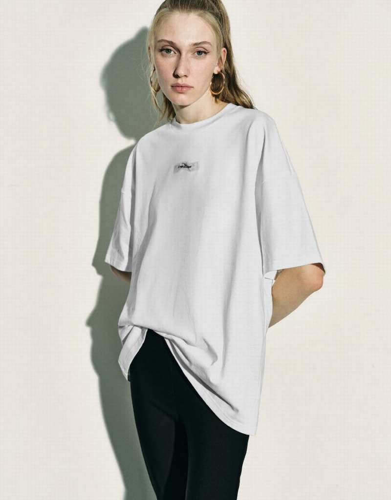 White Women's Urban Revivo Loose Straight T Shirts | ZPZ939CS