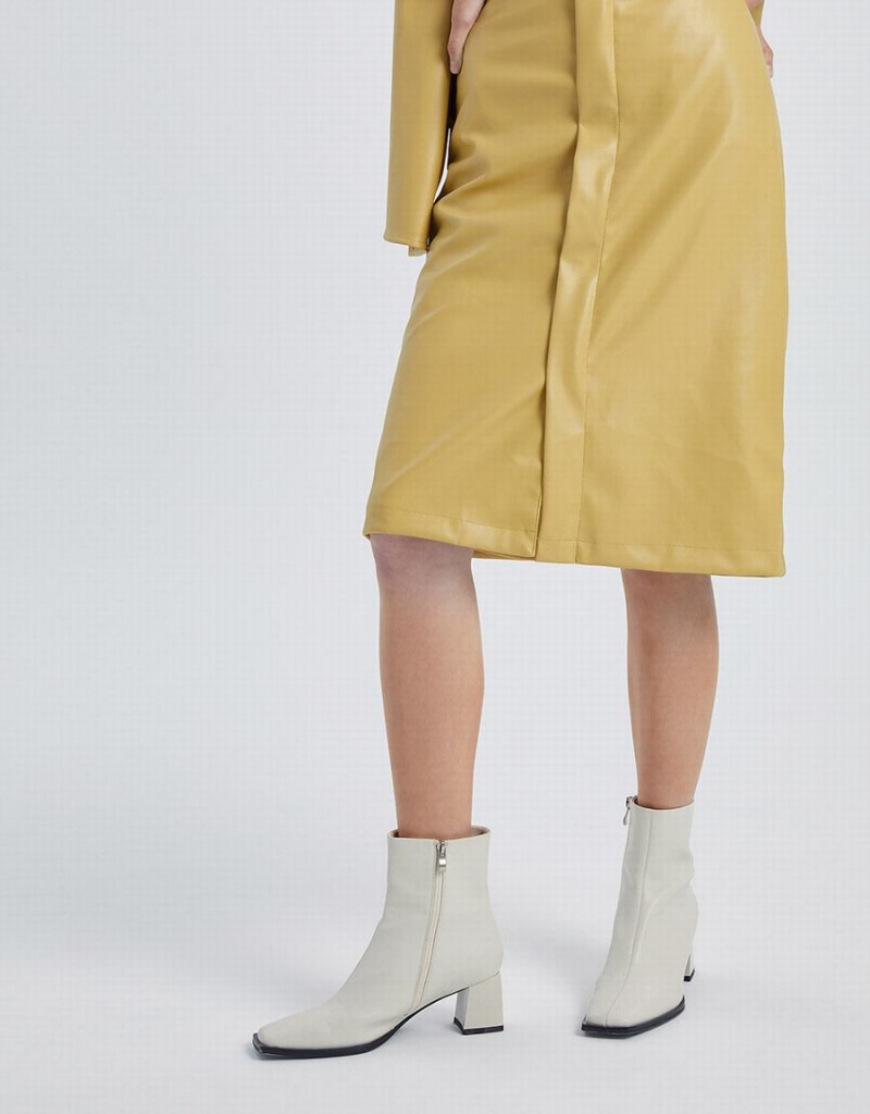 Yellow Women's Urban Revivo Midi Straight Skirts | NVW6872KW